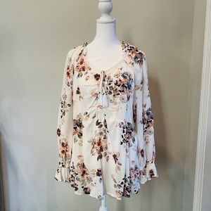 Floral long sleeve blouse.